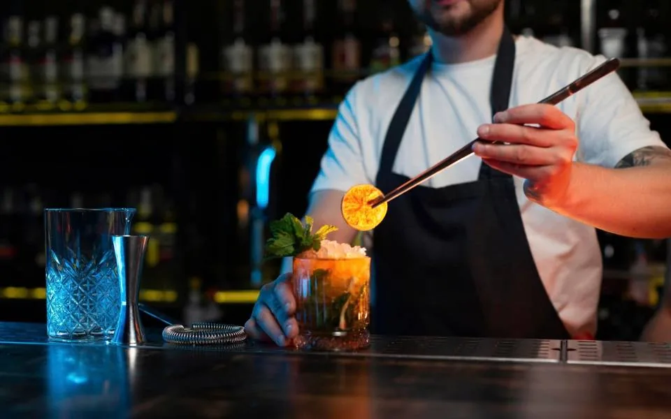 Bánh Xèo — Crispy turmeric-rice crêpe, pork belly, shrimp, bean sprouts.